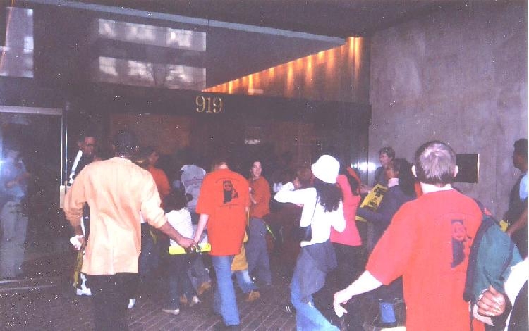 Protestors rush into...