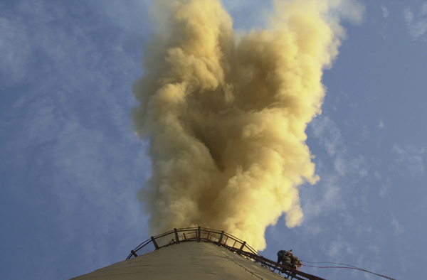 Climber on stack, di...